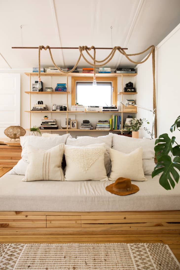 The Best Way to Place a Shelf in Front of a Window Apartment Therapy